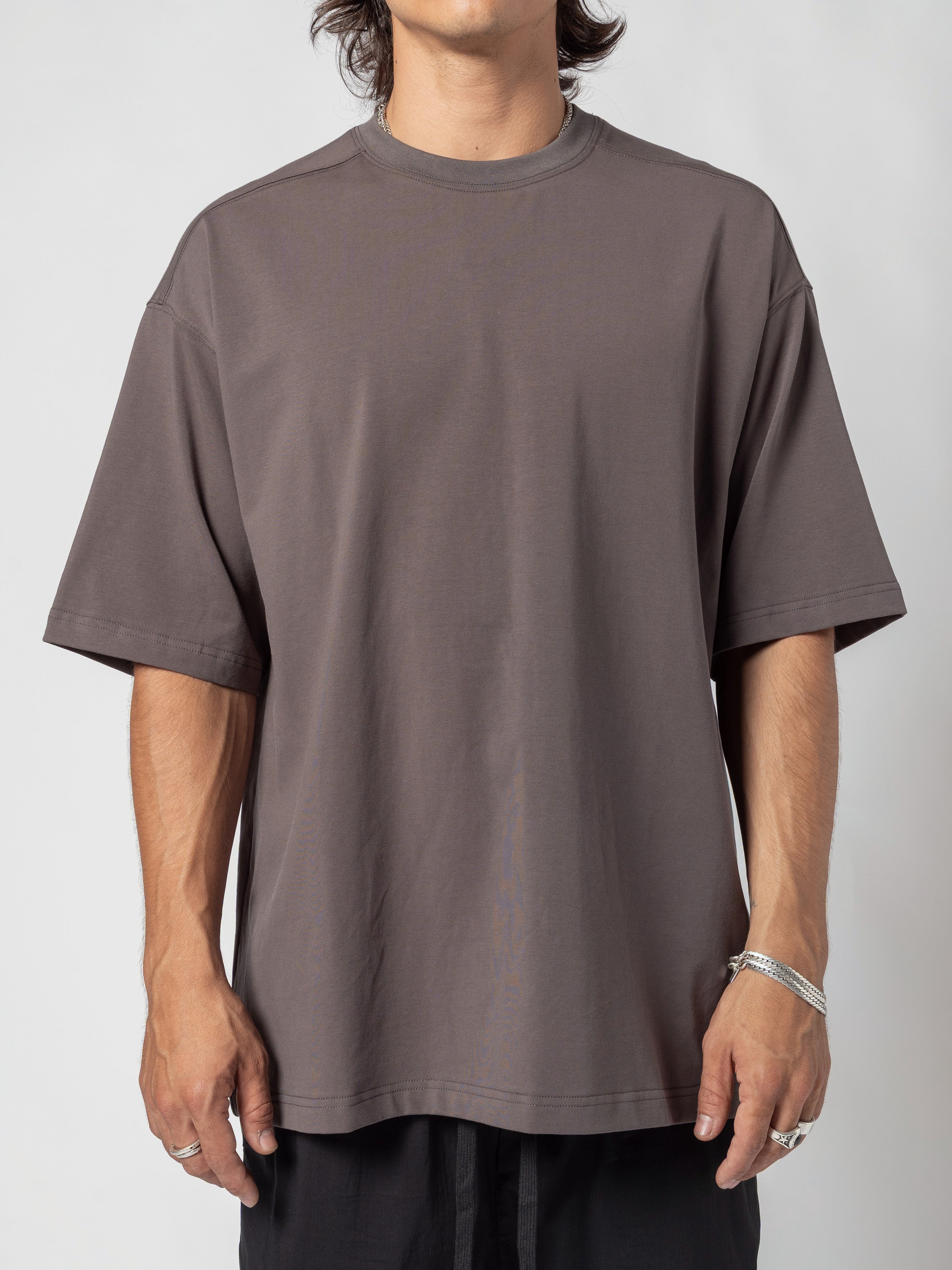 AITO Oversized Cotton T-Shirt in Dark Grey - front view squared to the camera, chest to hem, arms resting at the sides