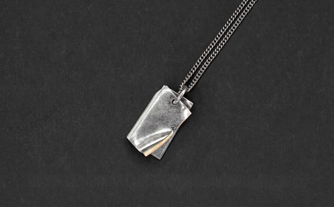 Folded gold edge necklace - by Tobias Wistisen