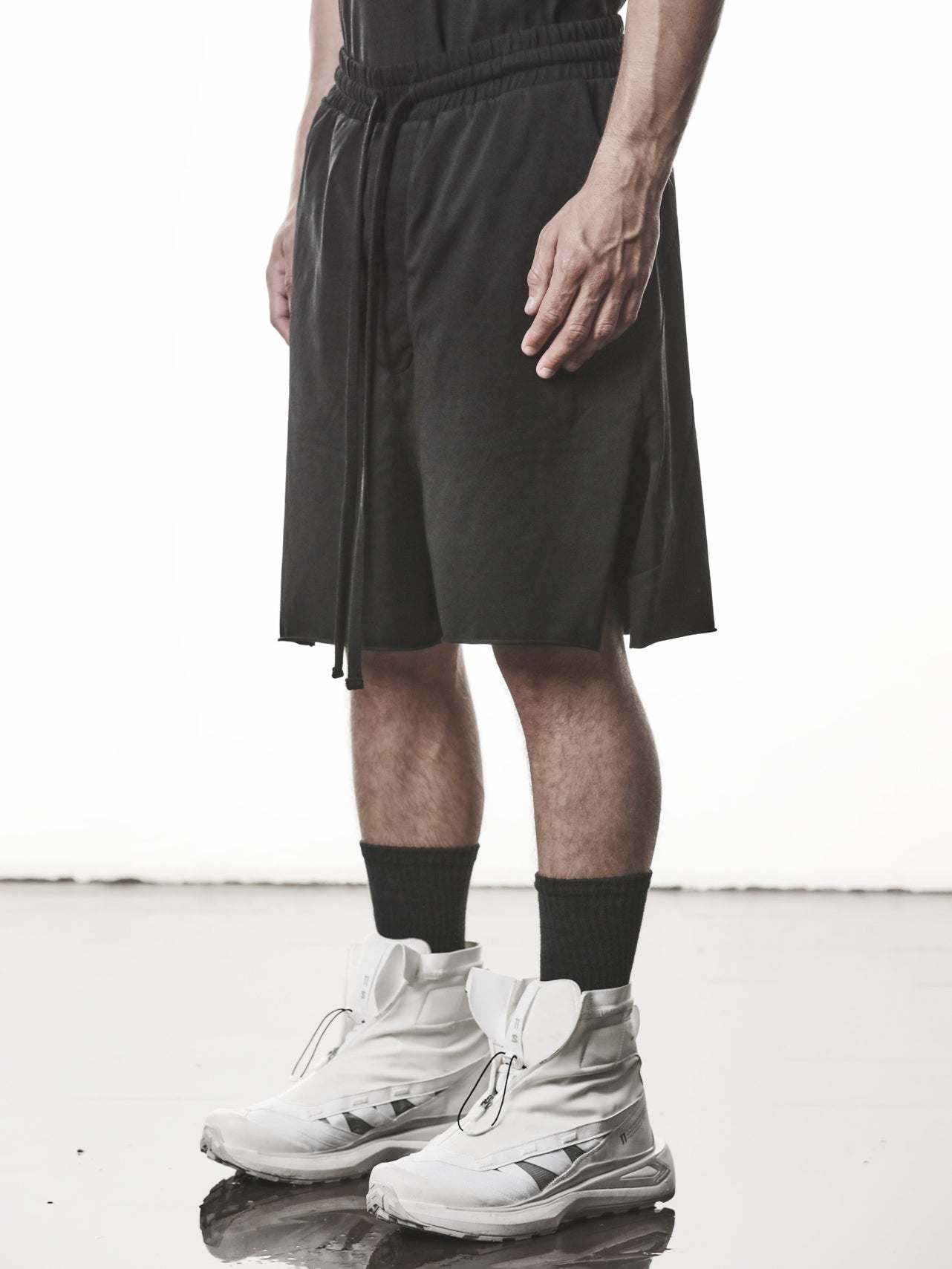 THOM KROM Matmix Cotton Shorts black - full length on model, showing relaxed fit
