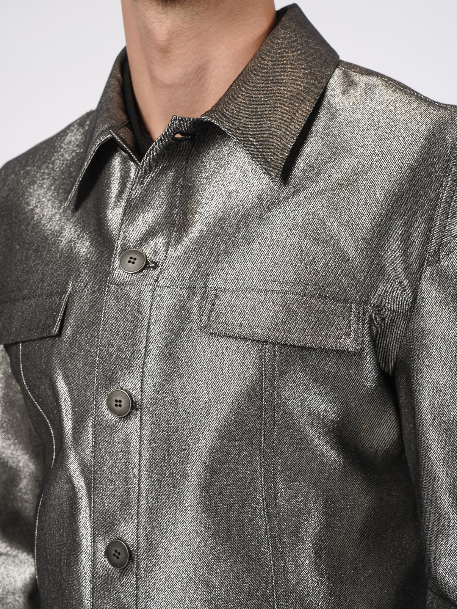 SAPIO metallic cropped jacket collar and chest flap close-up, crackled metallic surface texture
