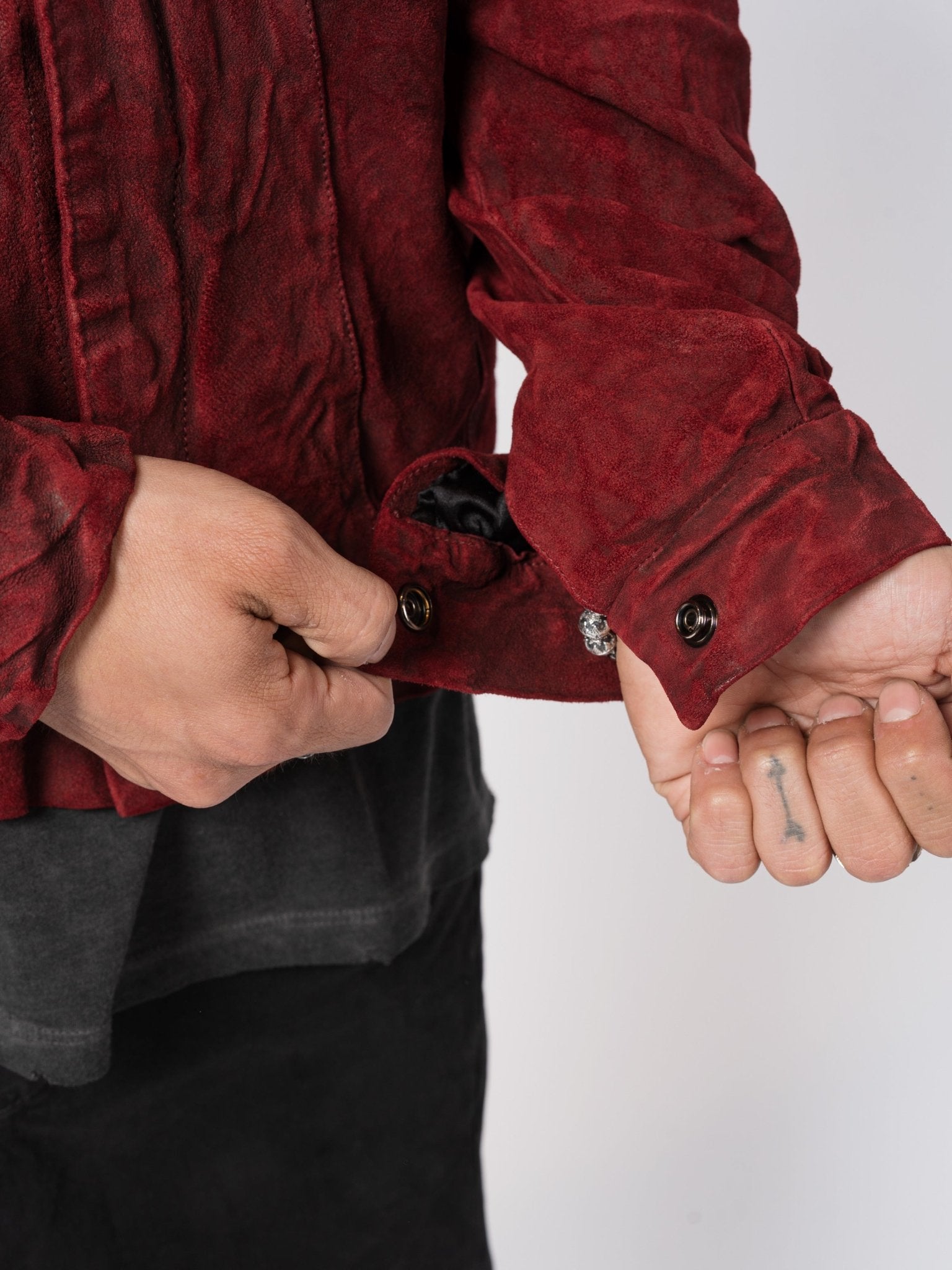 Giorgio Brato crimson leather jacket rear view - structured panel seam construction, reverse finish