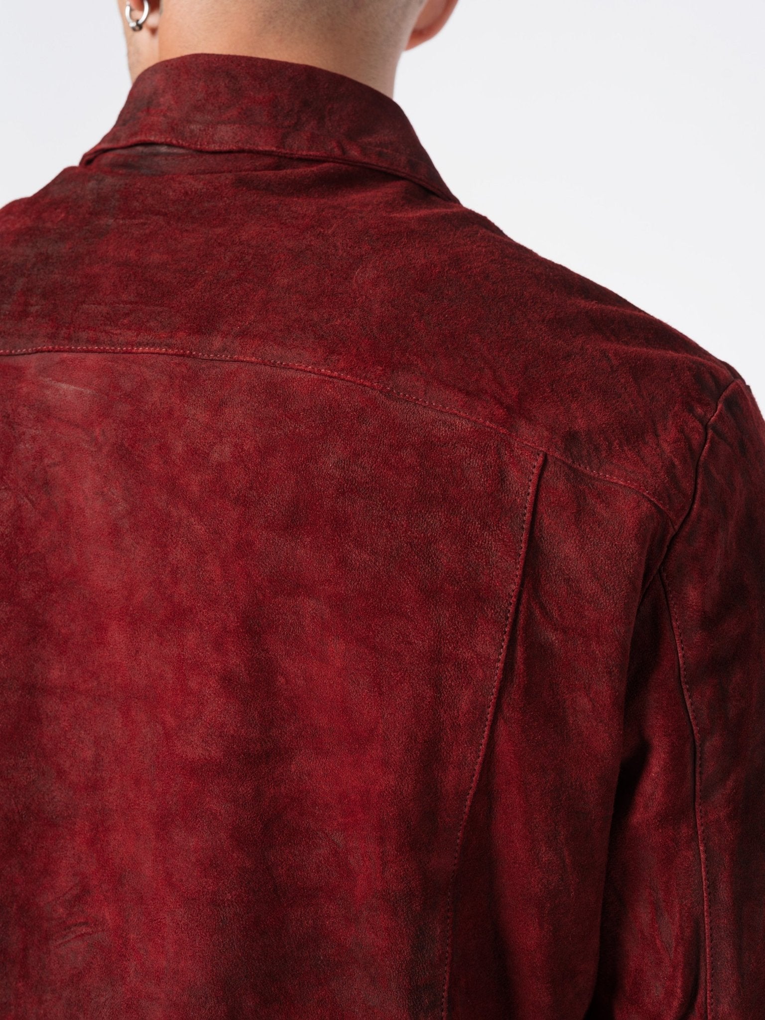 Giorgio Brato reverse leather jacket in crimson - close-up of matte vegetable-tanned suede surface