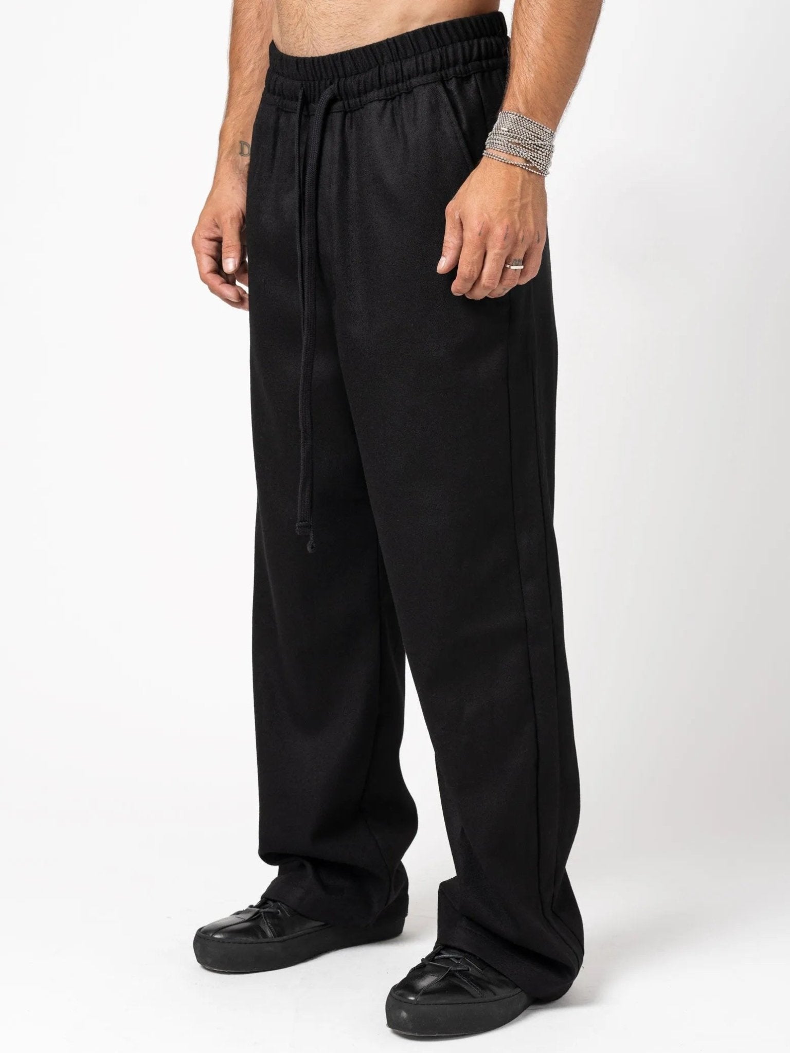 Wide leg wool trousers - by THOM KROM