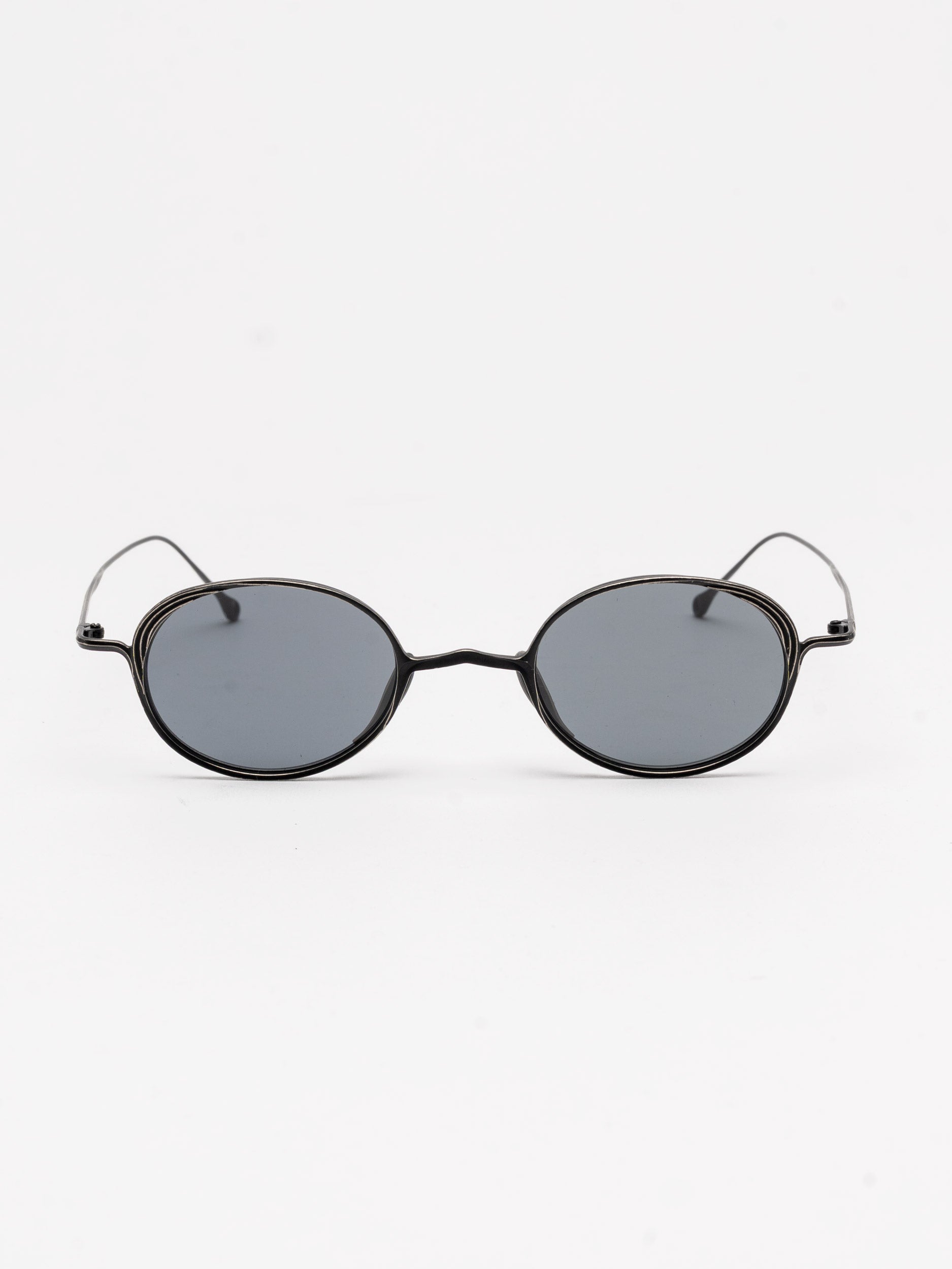 Oval Titanium Sunglasses