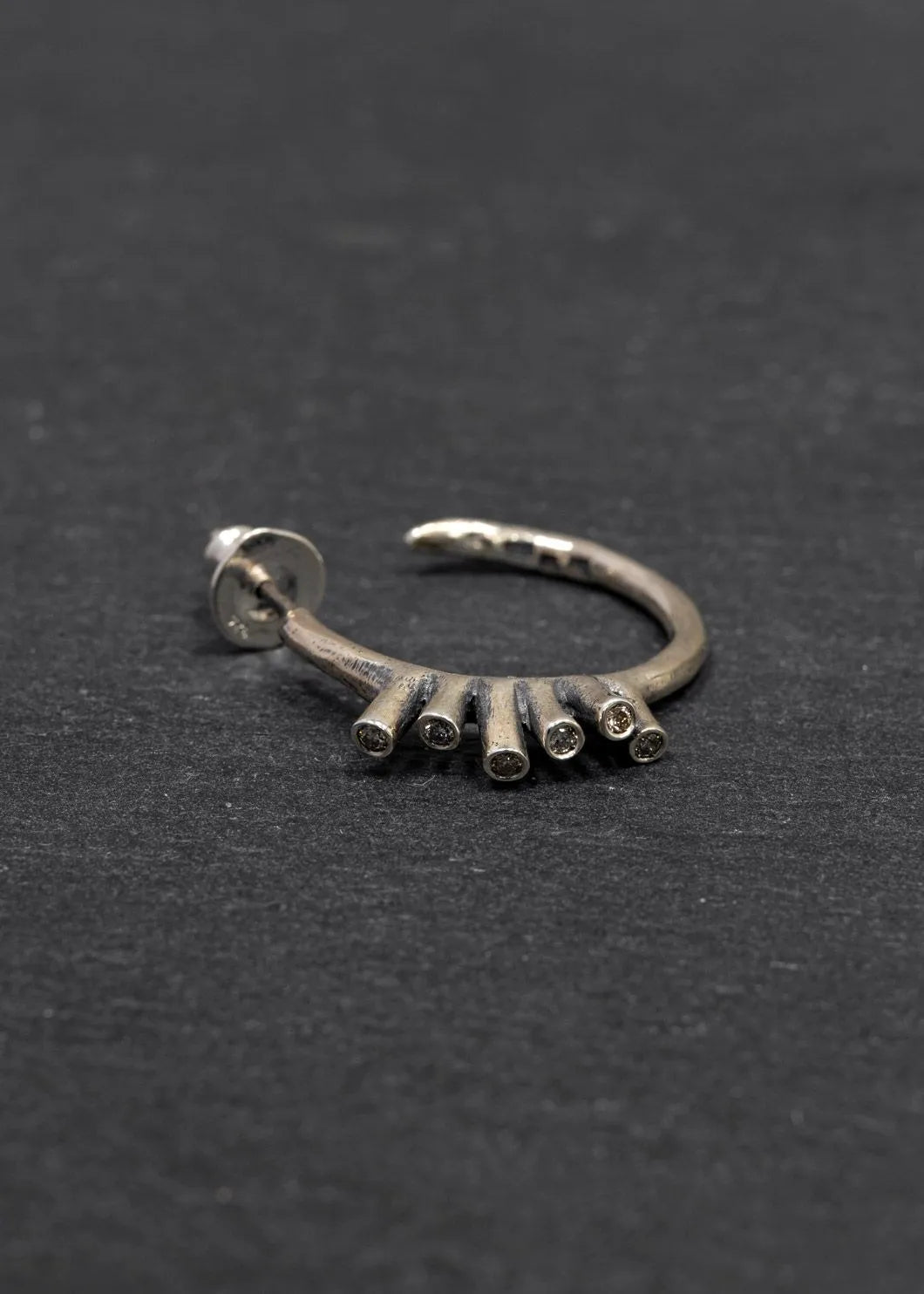 CORAL EARING - by TOBIAS WISTISEN