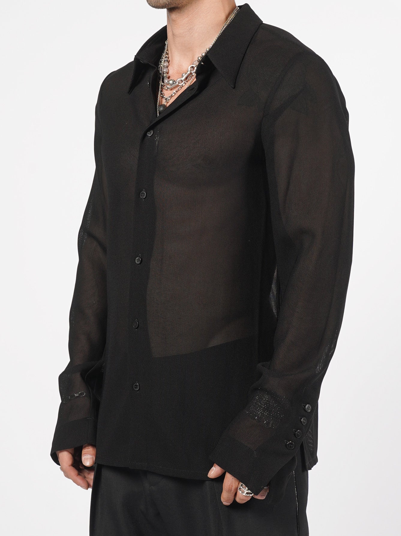 SAPIO sheer textured shirt side view, extended cuff, relaxed elongated silhouette