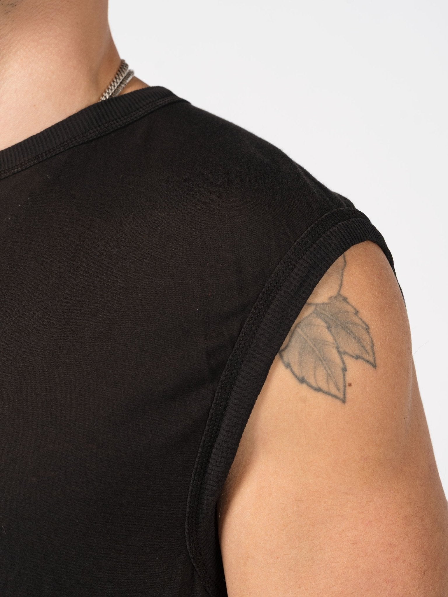 Sleeveless Top with Raw Edges - by BORIS BIDJAN SABERI